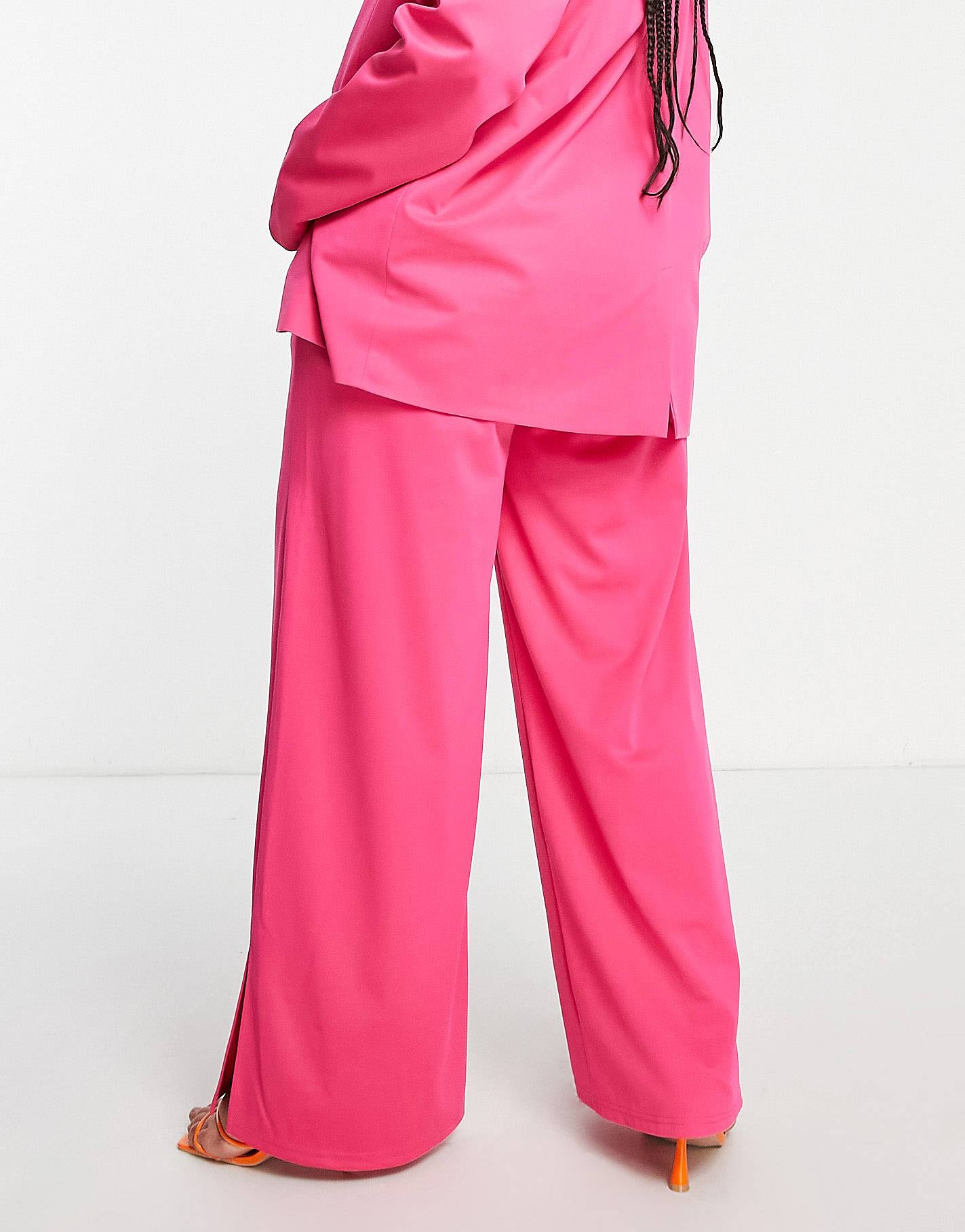 Plus slouchy wide leg trousers with leg split in hot pink