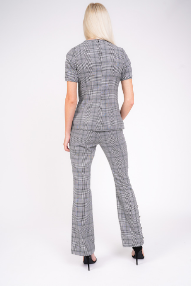 check short sleeve top from behind full outfit shot